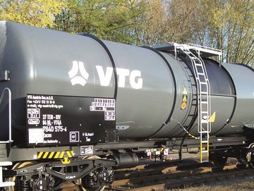 Dark gray chemical tank car with VTG logo.