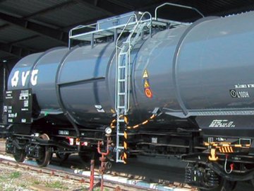 Dark gray chemical tank car with white VTG logo.