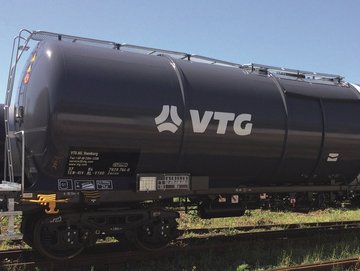 Dark gray chemical tank car with white VTG logo.