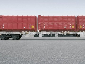 Red intermodal wagon with three elements on gray background.