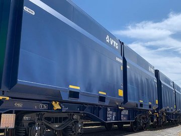 Blue ModuBox cars with white VTG logo.