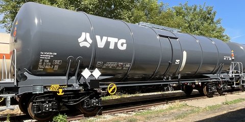 Gray mineral oil tank car with white VTG logo.