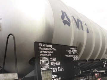 White chemical tank car with blue VTG logo.