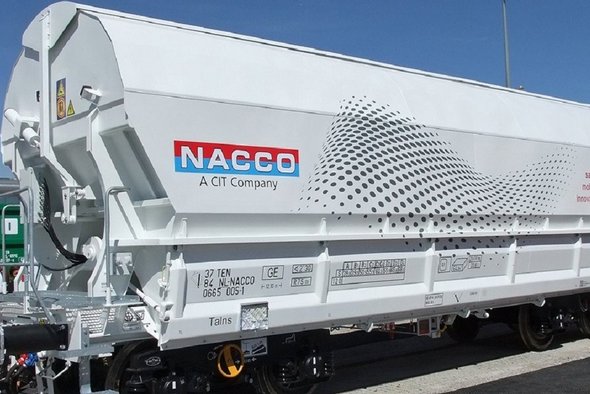 White hopper car with blue and red logo.