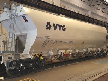 White hopper car with blue VTG logo.