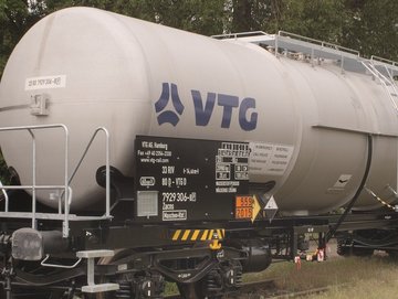 White chemical tank car with blue VTG logo.