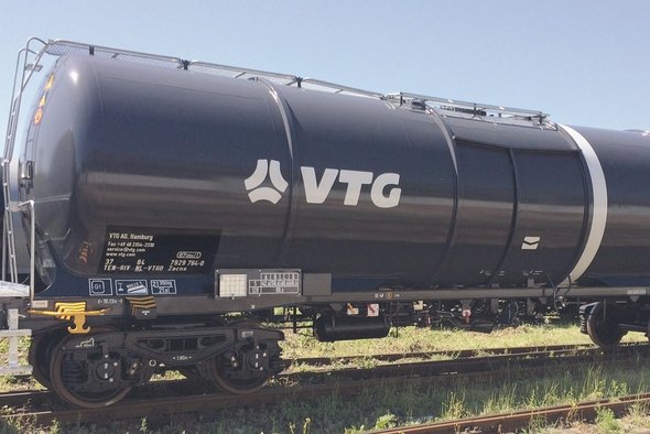 Dark gray chemical tank car with white VTG logo.